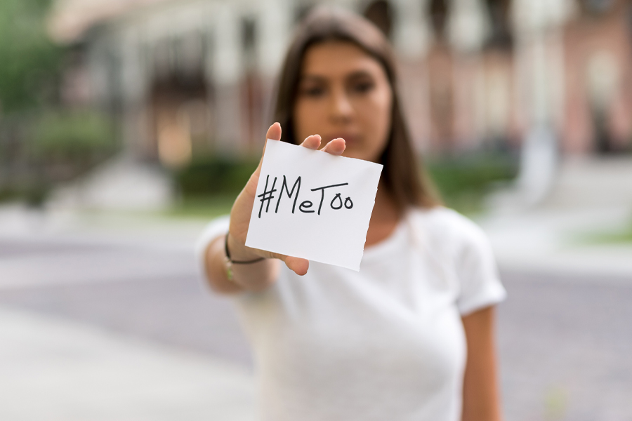 woman holding a piece of paper